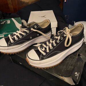 Black low top hike hi sneakers worn be good condition maybe need new strings